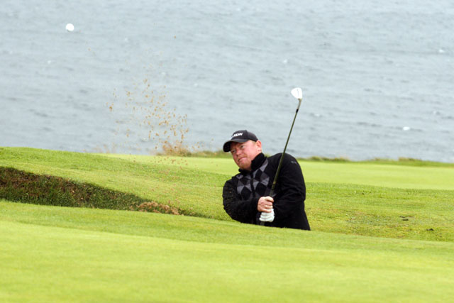 Örn Ævar á sama stalli og McIlroy í klúbbhúsinu í St. Andrews